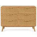 Commode beige à six tiroirs ajourés et angles arrondis