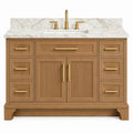 Meuble vasque beige à portes striées, tiroirs et plan blanc veiné